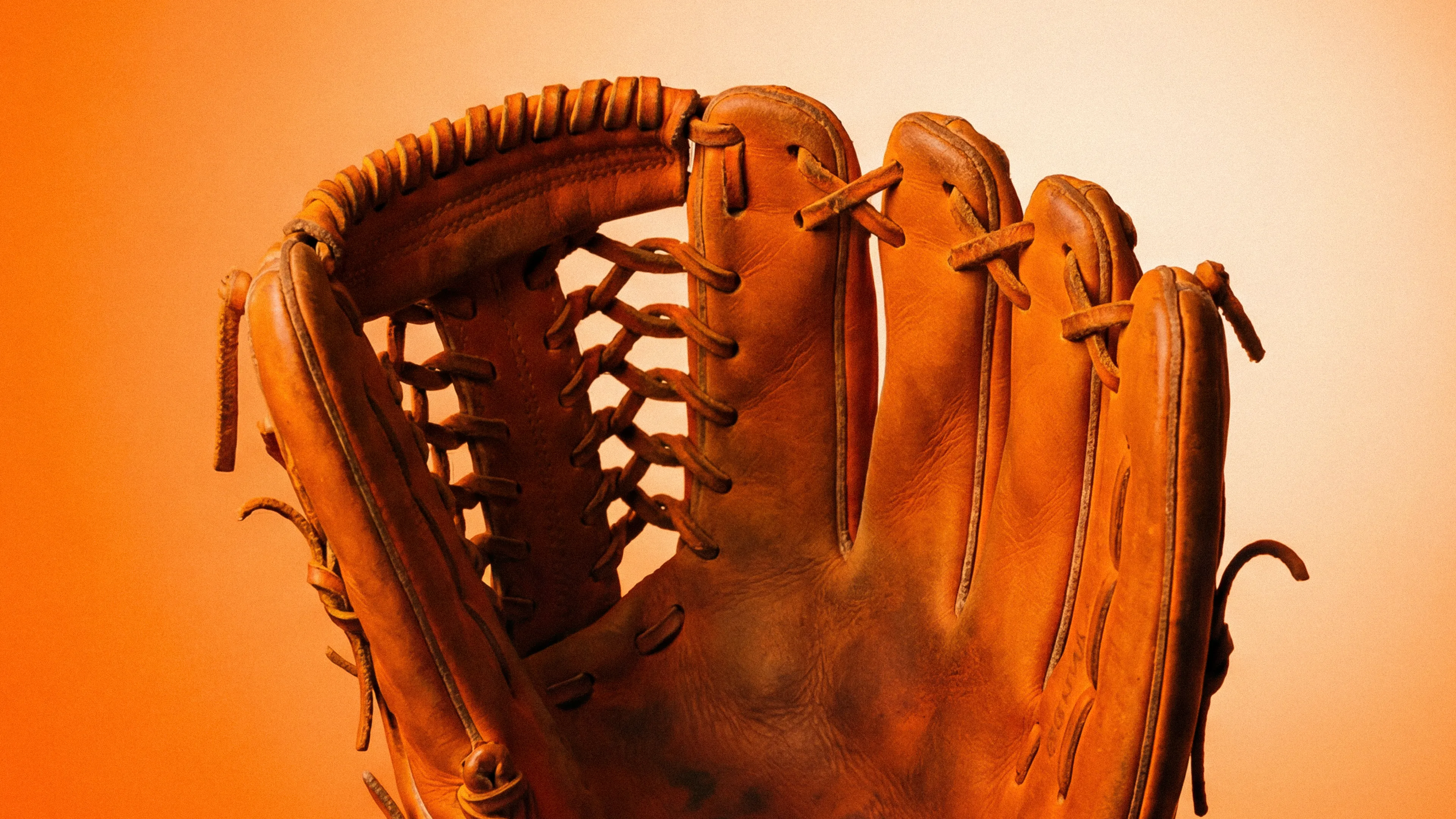 An open baseball glove representing MLB free agency news 2026